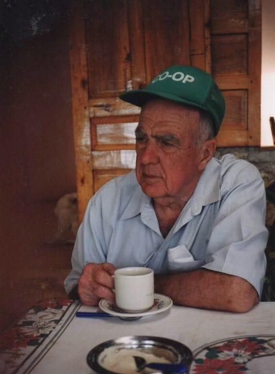 Jack Wall wearing a cooperative cap, in Haiti.